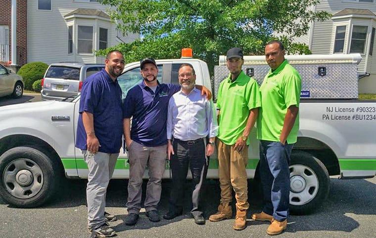 Bugaboo Pest Control service vehicle and employees